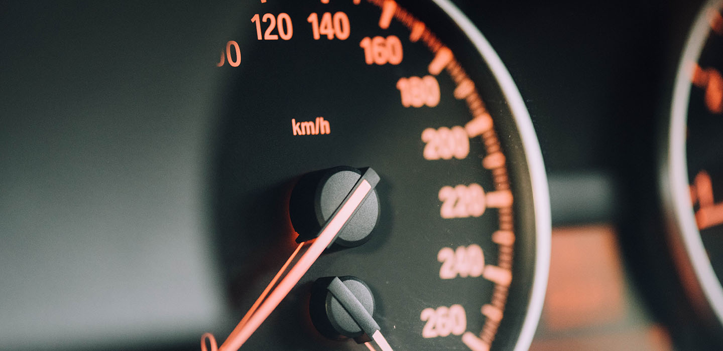 Close up of car's speedometer.