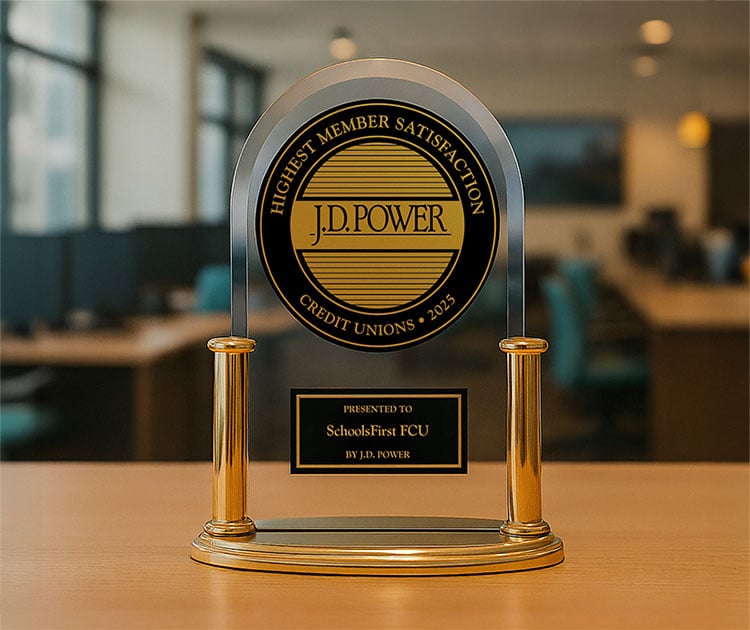 Picture of a J.D. Power trophy awarded to SchoolsFirst FCU.