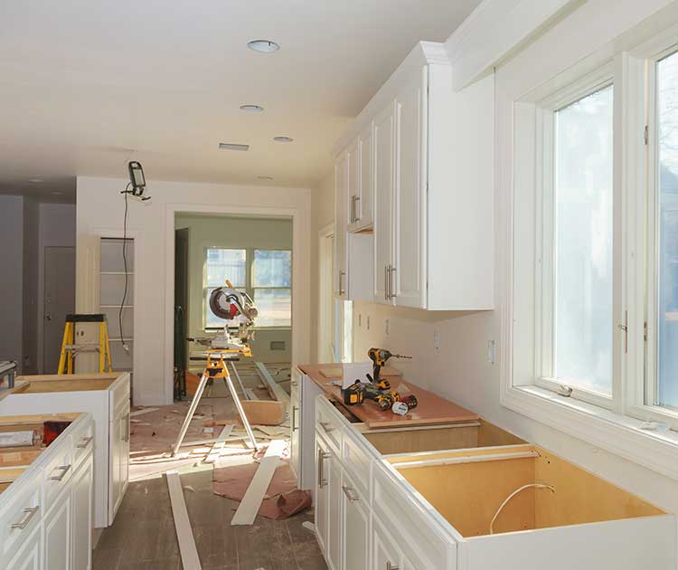 Home improvement of kitchen cabinets being built and installed.