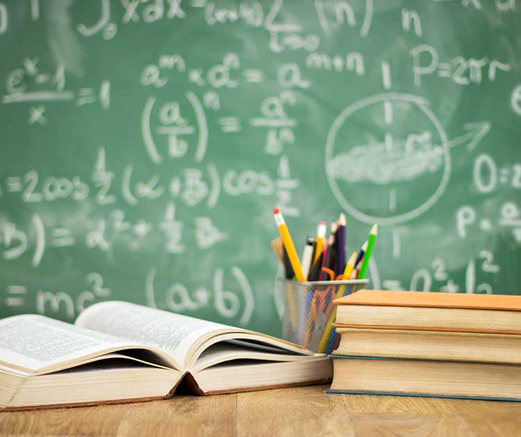 School books on desk.